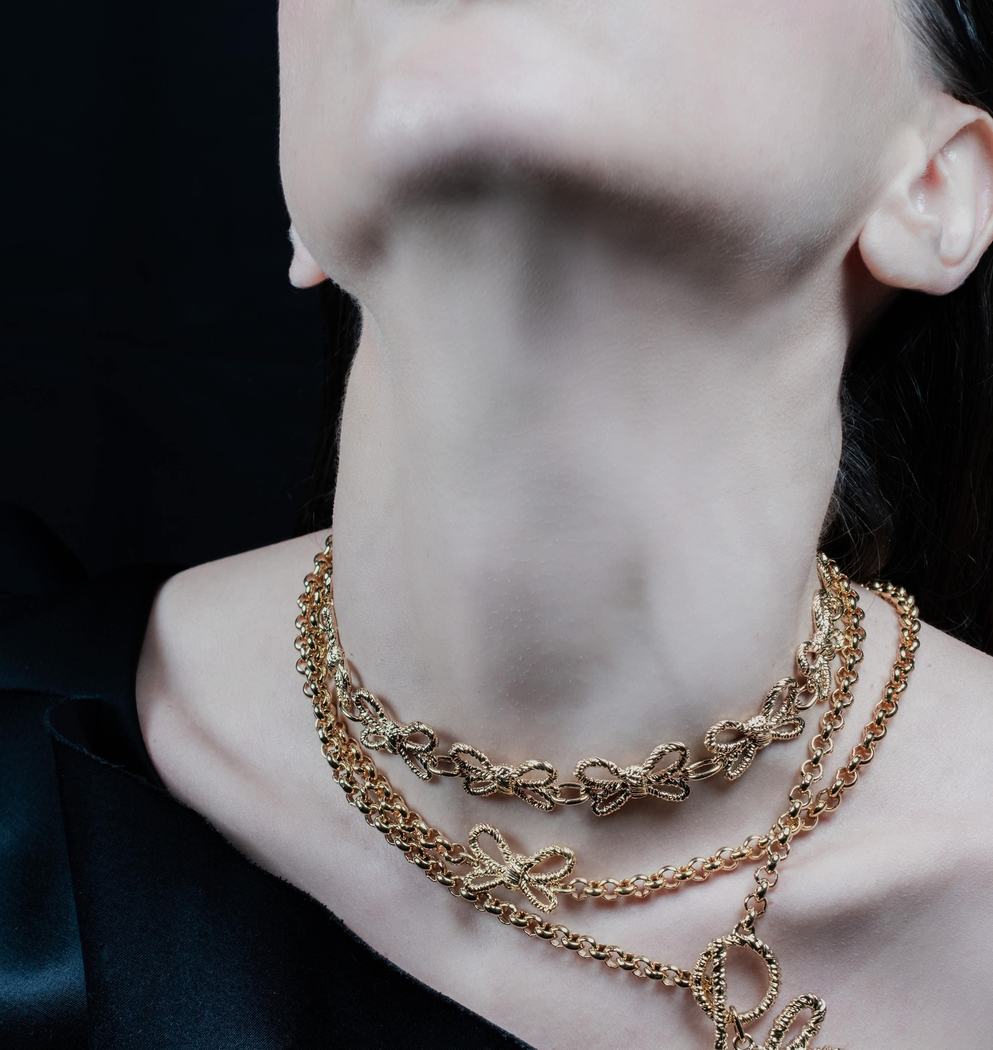 Necklace ALL OVER SMALL BOW TWYST Gold