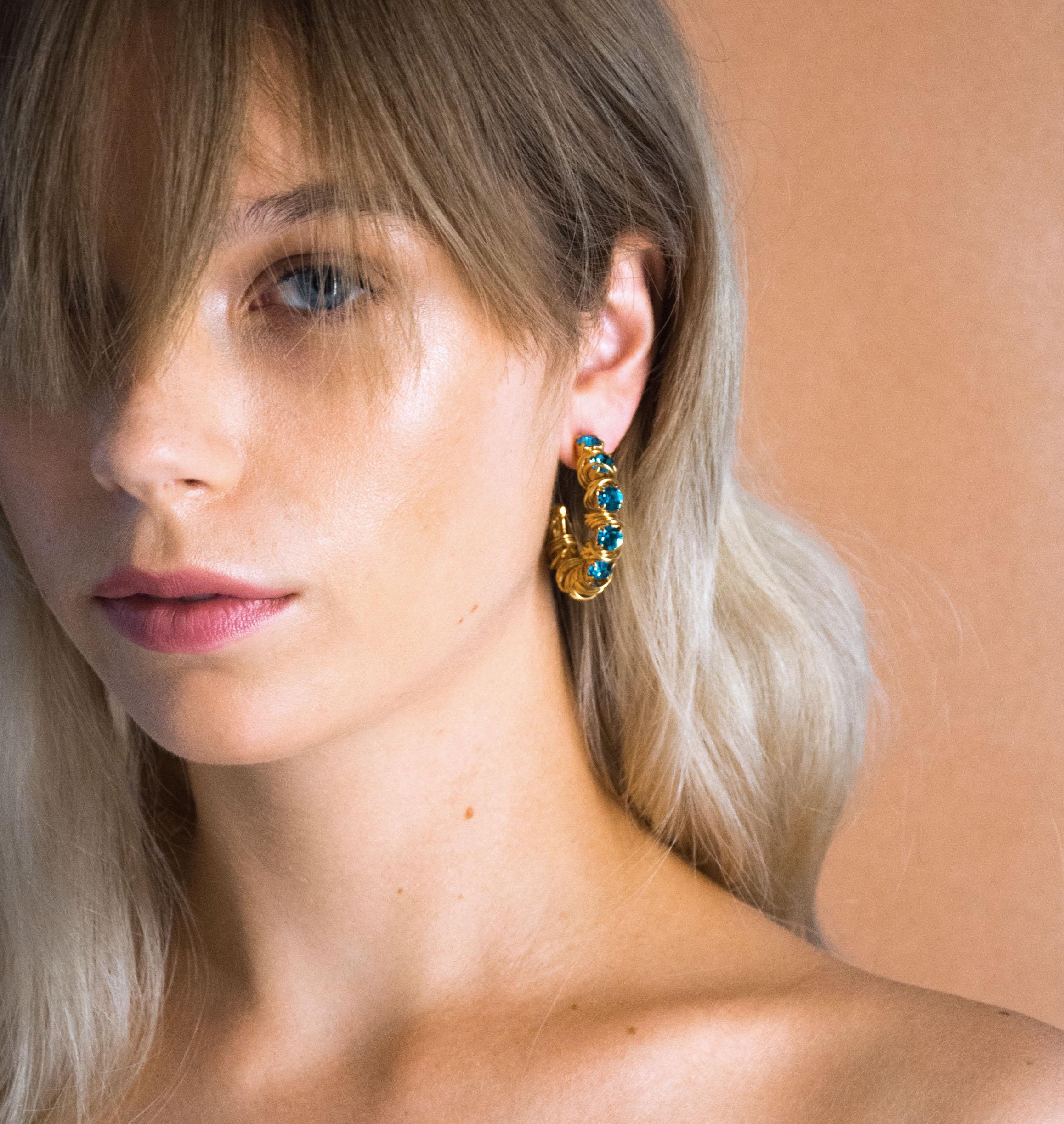 Earrings DISCO Indicolite - shop.mouttoncollet.com, moutton collet, bijoux createurs, bijoux fait main, bijoux fantaisie, bijoux en cristal strass, bijoux cristal swarovski, bijoux luxe, bijoux de stars, bijoux vip, bijoux originaux, bijou original, idee cadeau femme, cadeau de noel, cadeau chic et elegant, bijou moderne, bijou contemporain, fashion week boucles d'oreille créole en cristal strass bleu indicolite, madonna, kate moss,aya nakamura, daphne burki, vogue france magazine