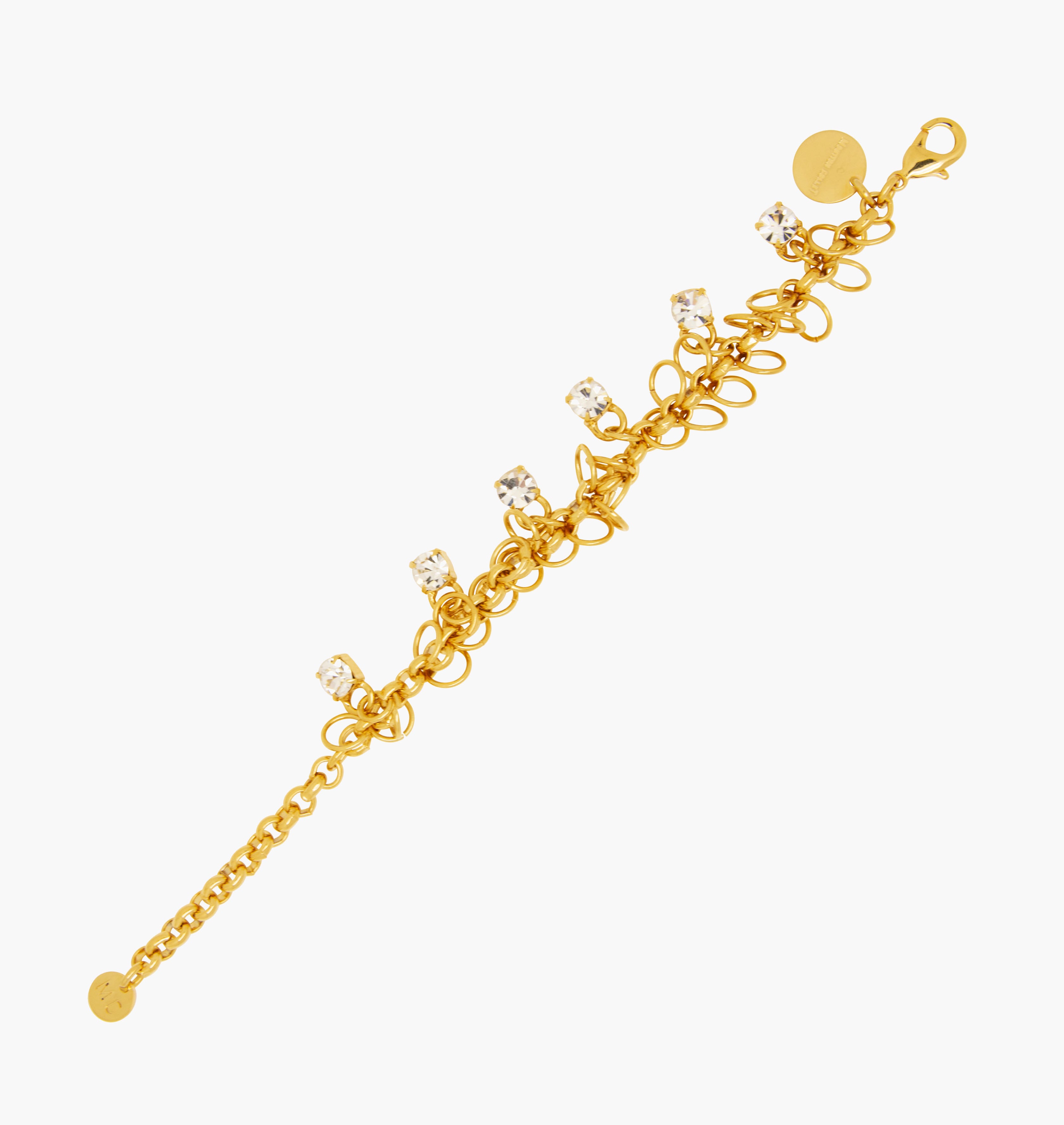 Bracelet STARS Crystal - shop.mouttoncollet.com, Moutton collet, Notre bracelet STARS est réalisé en bronze dorées à l'or fin, serties de cristaux scintillants coloris diamant avec de grands anneaux. Il est orné d'un médaillon gravé "Moutton colleT" et d'un petit logo gravé "MC". Il sera assez discret pour être associé à vos tenues du quotidien, strass cristal swarovski, bijou createur, bijoux vogue, bijoux fantaisie, bracelet strass brillant,