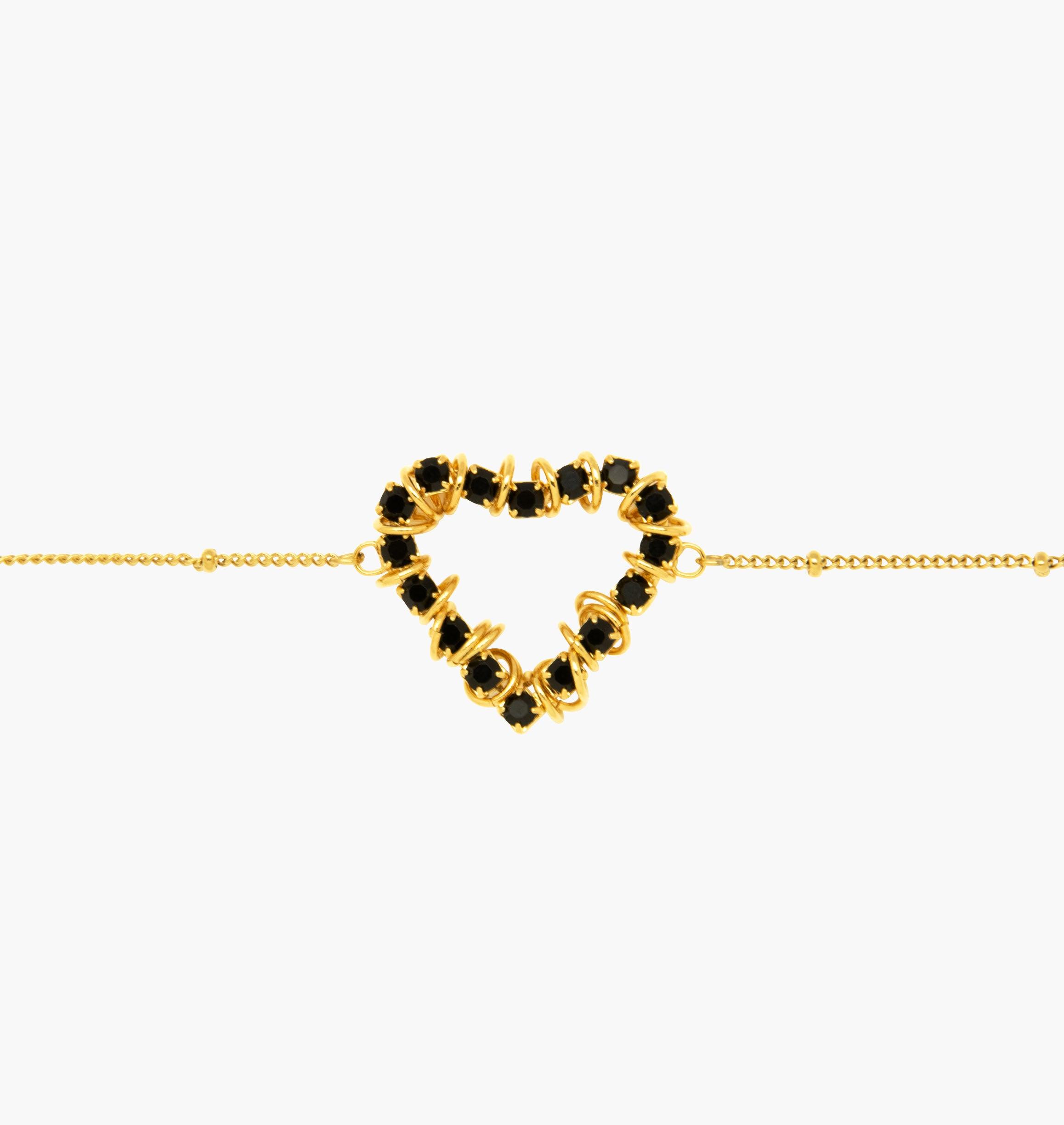 Bracelet BISOUS Black - shop.mouttoncollet.com, Moutton colleT, Notre bracelet BISOUS est réalisé en bronze doré à l'or fin, serti de cristaux scintillants coloris noir avec de grands anneaux. Il est orné d'un médaillon gravé "Moutton colleT" et d'un petit logo gravé "MC". Il sera assez discret pour être associé à vos tenues du quotidien, bracelet strass fantaisie de qualite, bracelet coeur bijou, bijou amour, bracelet amour, style rock, fashion, mode, vogue,