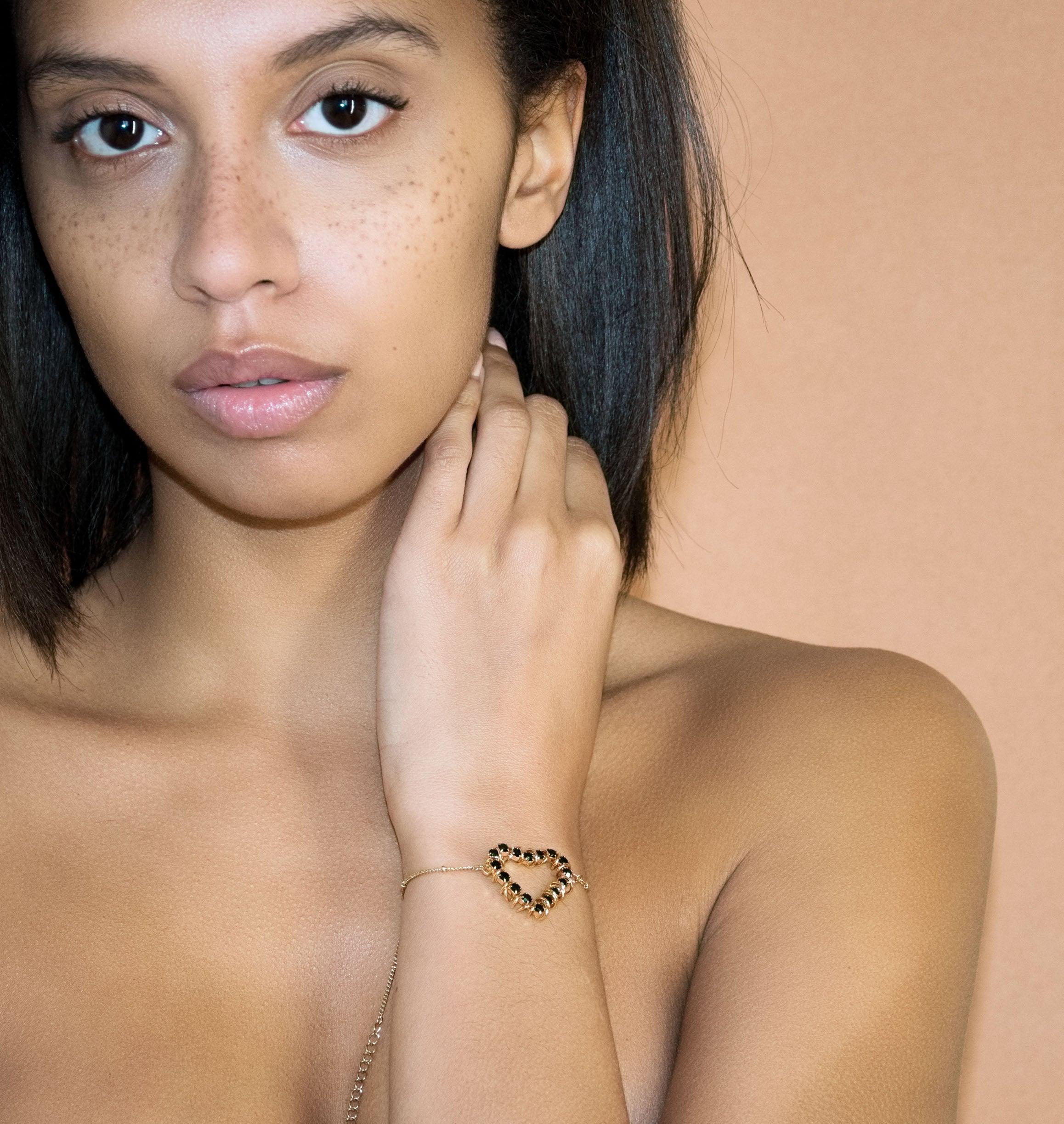 Bracelet BISOUS Black - shop.mouttoncollet.com, Moutton colleT, Notre bracelet BISOUS est réalisé en bronze doré à l'or fin, serti de cristaux scintillants coloris noir avec de grands anneaux. Il est orné d'un médaillon gravé "Moutton colleT" et d'un petit logo gravé "MC". Il sera assez discret pour être associé à vos tenues du quotidien, bracelet strass fantaisie de qualite, bracelet coeur bijou, bijou amour, bracelet amour, style rock, fashion, mode, vogue,