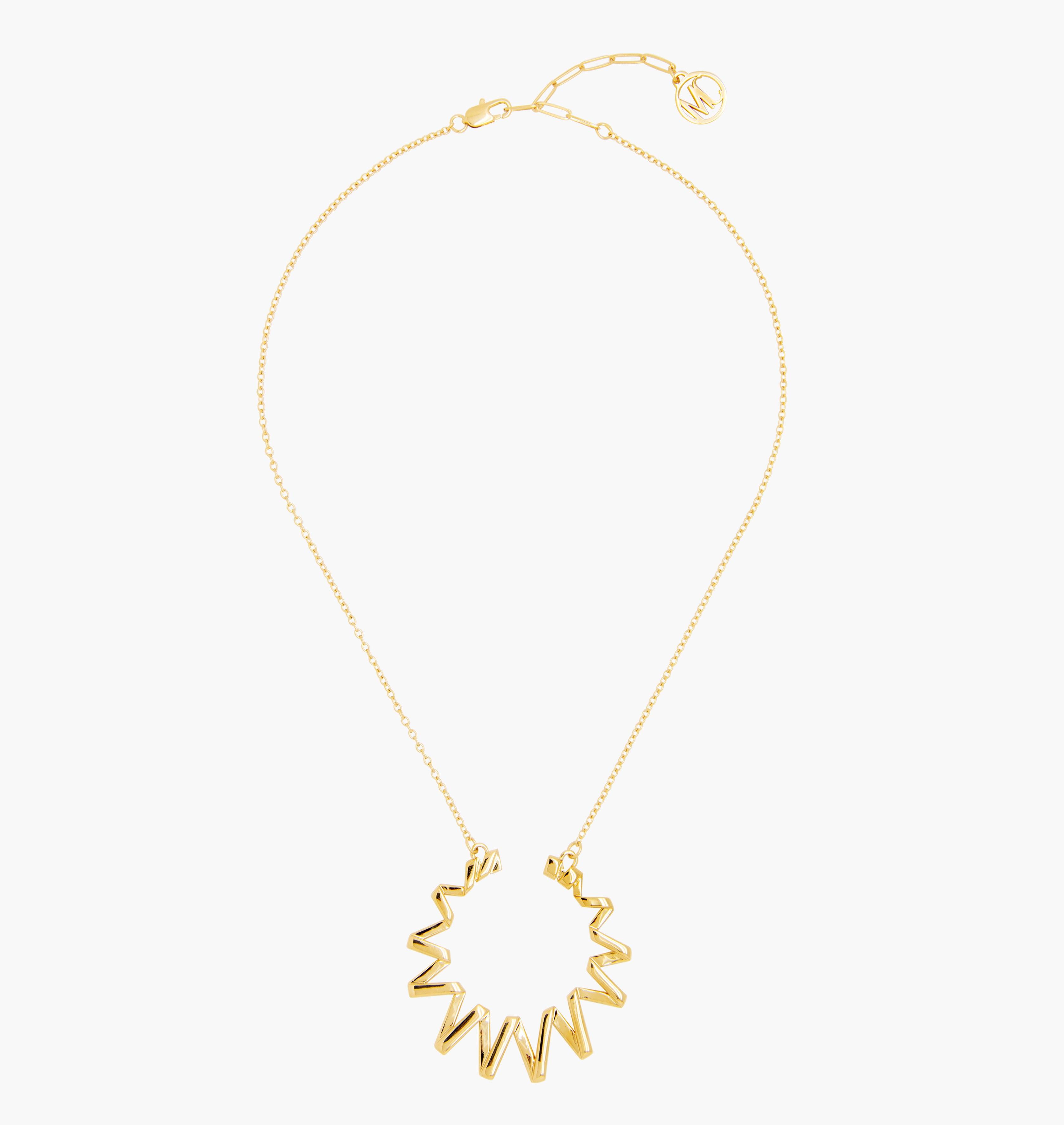 Moutton colleT Notre pendentif FRISSON est réalisé en bronze doré à l'or fin. Il est orné d'un petit logo "MC". Il habillera votre cou avec une touche fun et chic, pour un look modern et peps. bijoux doré or, bijoux créateurs fabriqué made in Belgium , pendentif originale, pendentif or doré, pendentif , année 80, collier.