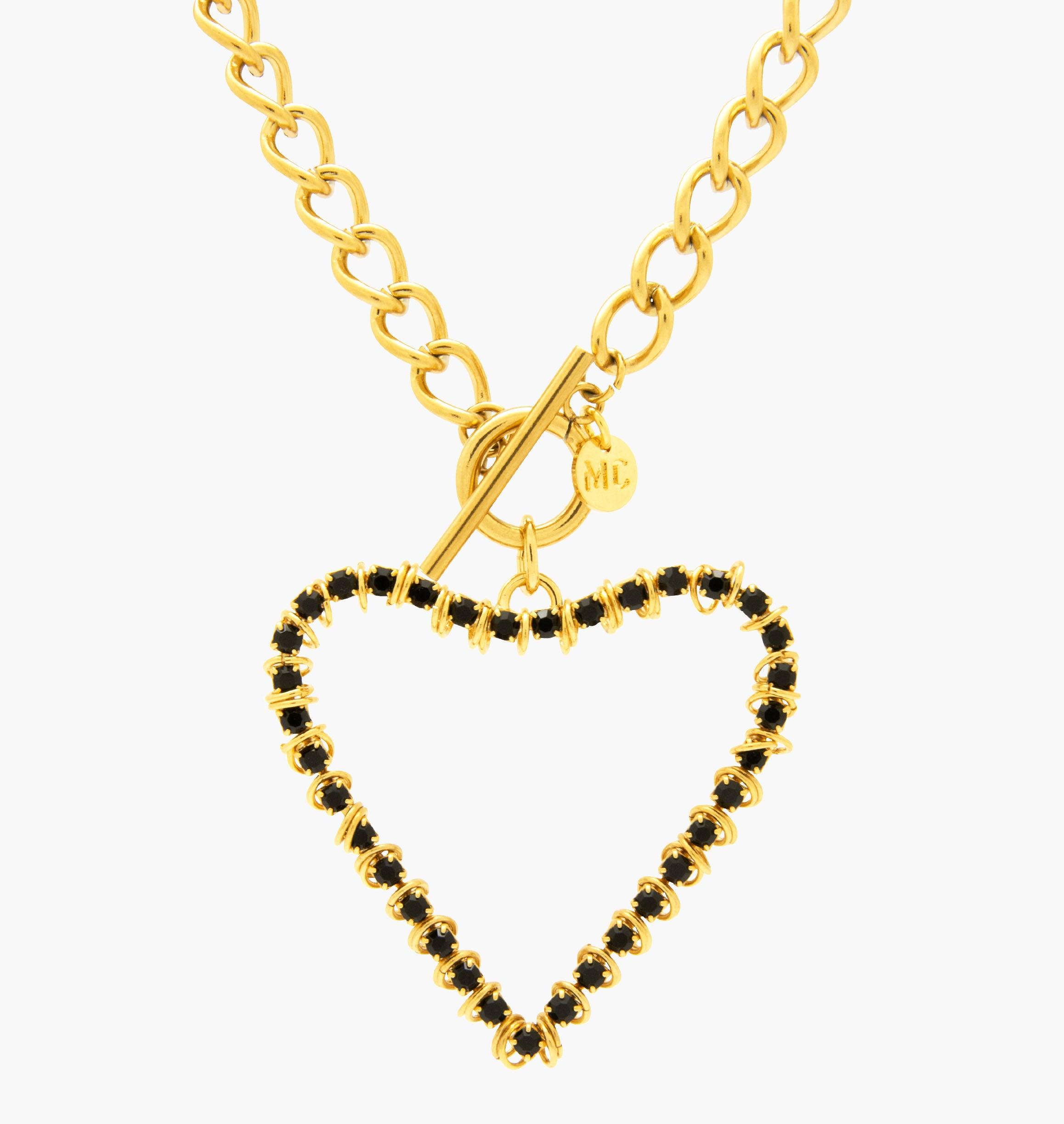 Necklace BISEBISE Black - shop.mouttoncollet.com, Moutton colleT, Notre collier BISEBISE est réalisé en bronze dorées à l'or fin, serties de cristaux scintillants coloris noir et de petits anneaux. Elles seront parfaites pour look moderne et étincelant, bijoux strass, bijou coeur, bijoux or doré, bijoux xl,