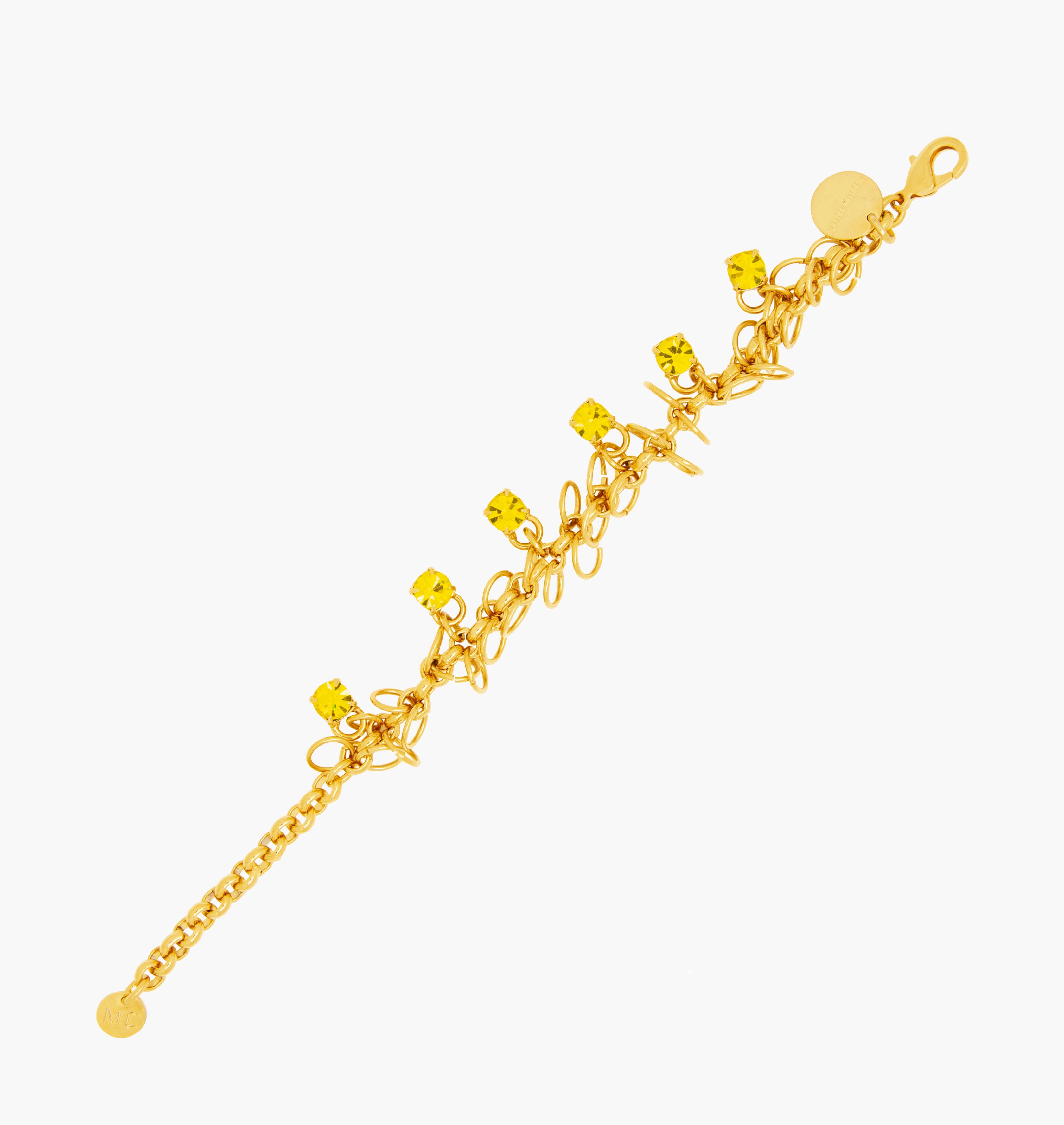 Bracelet STARS Citrine - shop.mouttoncollet.com, Moutton colleT, Notre bracelet STARS est réalisé en bronze dorées à l'or fin, serties de cristaux scintillants coloris jaune citrine avec de grands anneaux. Il est orné d'un médaillon gravé "Moutton colleT" et d'un petit logo gravé "MC". Il sera assez discret pour être associé à vos tenues du quotidien, strass cristal swarovski, moutton collet, bijoux jaune et or doré,